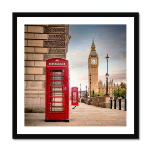 Vintage telephone boxes below Big Ben Framed Print
